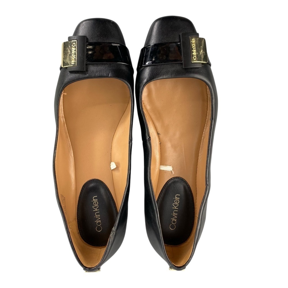 Calvin Klein Pacita black gold hardwear faux buckle casual flats women's size 9